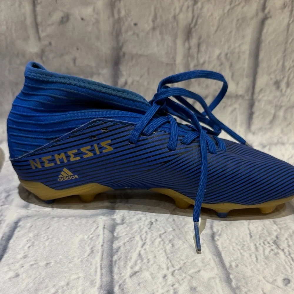 Blue Adidas Nemesis Cleats with White Accents